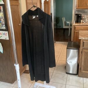 Woman’s long sweater